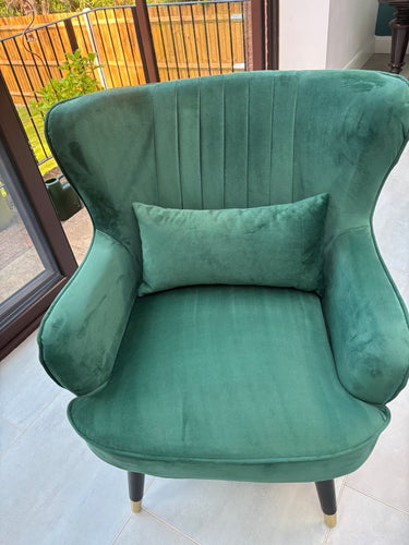 Green velvet armchairs