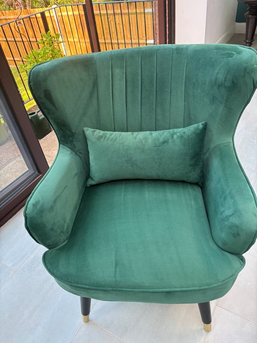 Green velvet armchairs