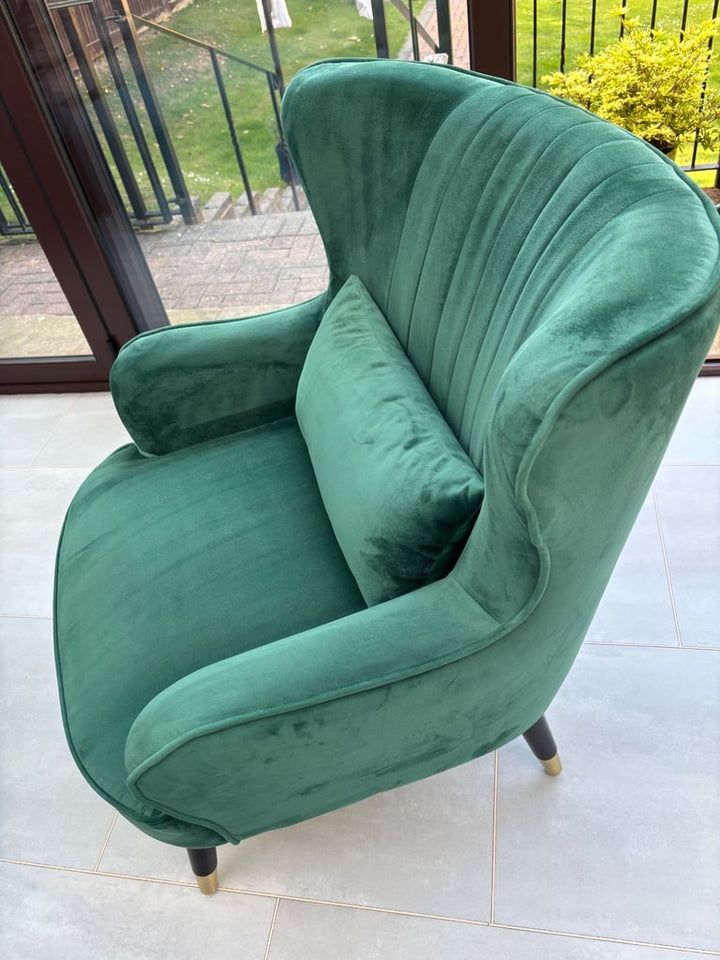 Green velvet armchairs