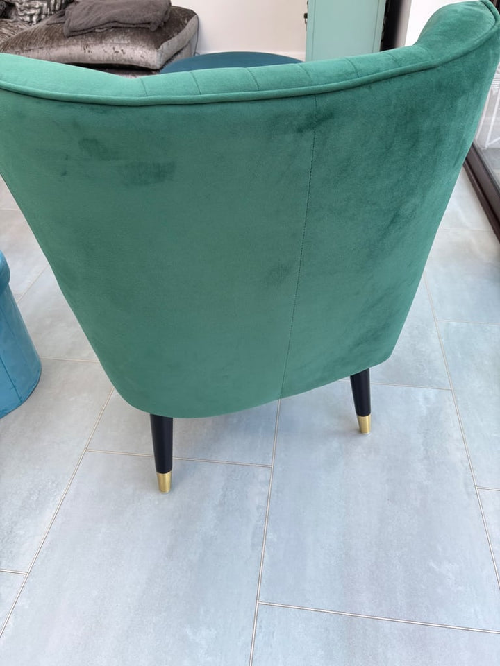Green velvet armchairs