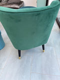 Green velvet armchairs